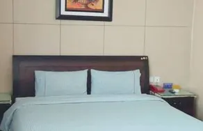 Magnolia Business Hotel (Yantai Longkou Heping Road Branch) - Image 5