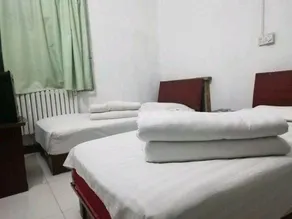 Xinjian Hotel - Image 5
