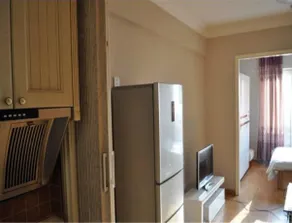 Huadu Apartment Hotel - Image 5
