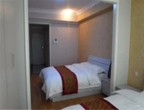 Huadu Apartment Hotel - Image 4