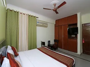 Capital O 12722 Hotel Kiara Inn - Image 5