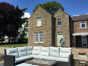 The Farmhouse - A Boutique Retreat - Image 1