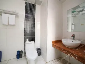 Jindong Zhixing Business Hotel - Image 5