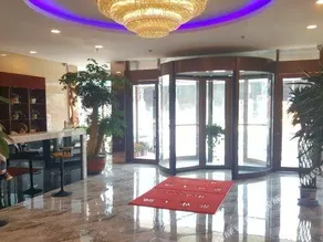 Huanle Business Hotel - Image 3
