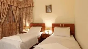 Palmland Hotel Suites - Image 4