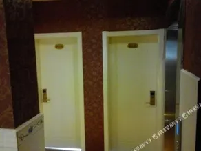 Qujing Ruixin Business Hotel - Image 5
