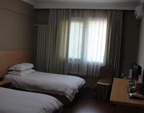 Yulong Garden Hotel - Image 3