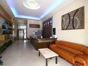 Yilongxin Business Hotel - Image 4
