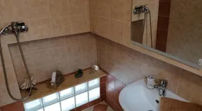 THEOS APARTMENTS - Image 5