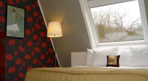 Mezzo Restaurant & Kamers - Image 2