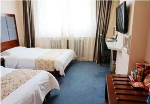 Yichuan Eddy Holiday Hotel - Image 4