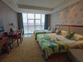 Xinriyue Yucai Hotel - Image 4