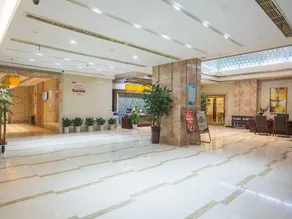 Hualong Meichen Hotel - Image 4