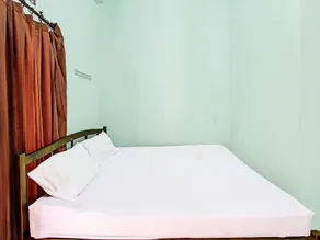 SPOT ON 91771 Homestay Bang Haji - Image 2