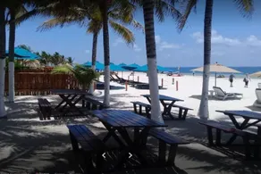 Capital O Hotel Arena Beach Club - Image 2