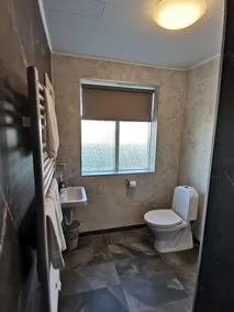 Mikligarður Guesthouse - Image 3