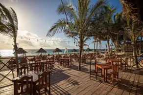 Capital O Hotel Arena Beach Club - Image 3