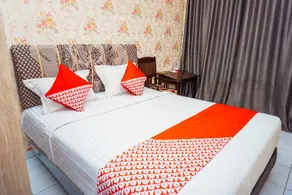 OYO 433 Nelvi Guest House Syariah - Image 5