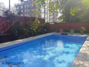 LINDA E CONFORTAVEL CASA COM PISCINA NO GUARUJA - Image 5