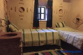 Maison en terre au milieu de la palmeraie - Image 3