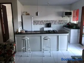 Casa com churrasqueira e garagem coberta - Image 2