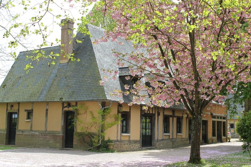 Une maison de campagne confortable dans un parc à l’anglaise