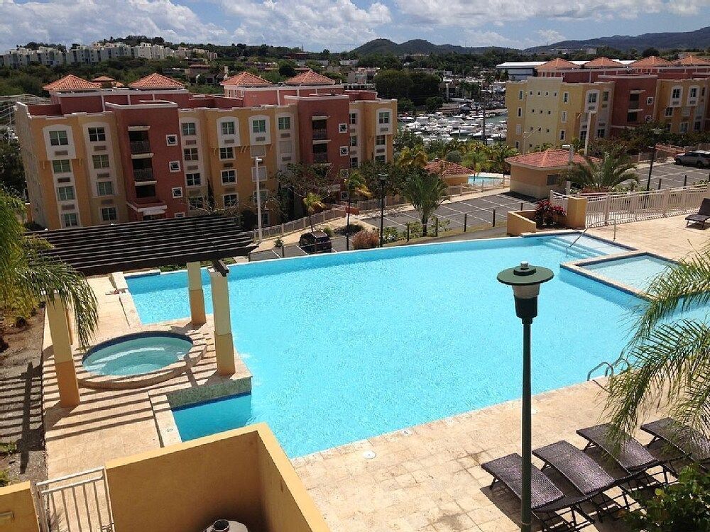 Caribbean Condo with Marina, Pool & Ocean View! 3 minutes from Seven Seas Beach. photo 6