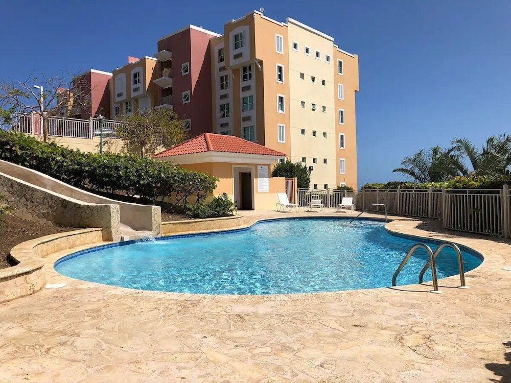 Caribbean Condo with Marina, Pool & Ocean View! 3 minutes from Seven Seas Beach. photo 4
