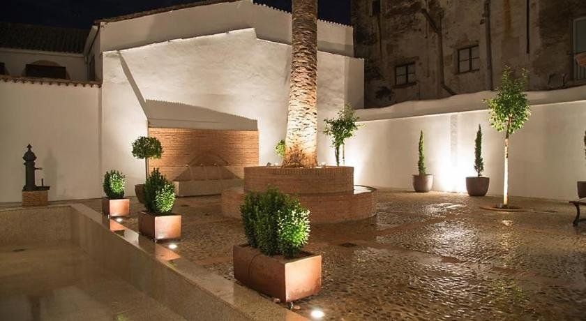 Palacio de Godoy Caceres, Curio Collection by Hilton